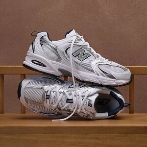 New Balance White and Silver Athletic Shoes